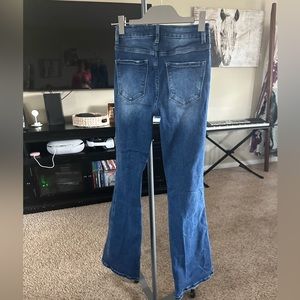 Boot cut, small ripped jeans